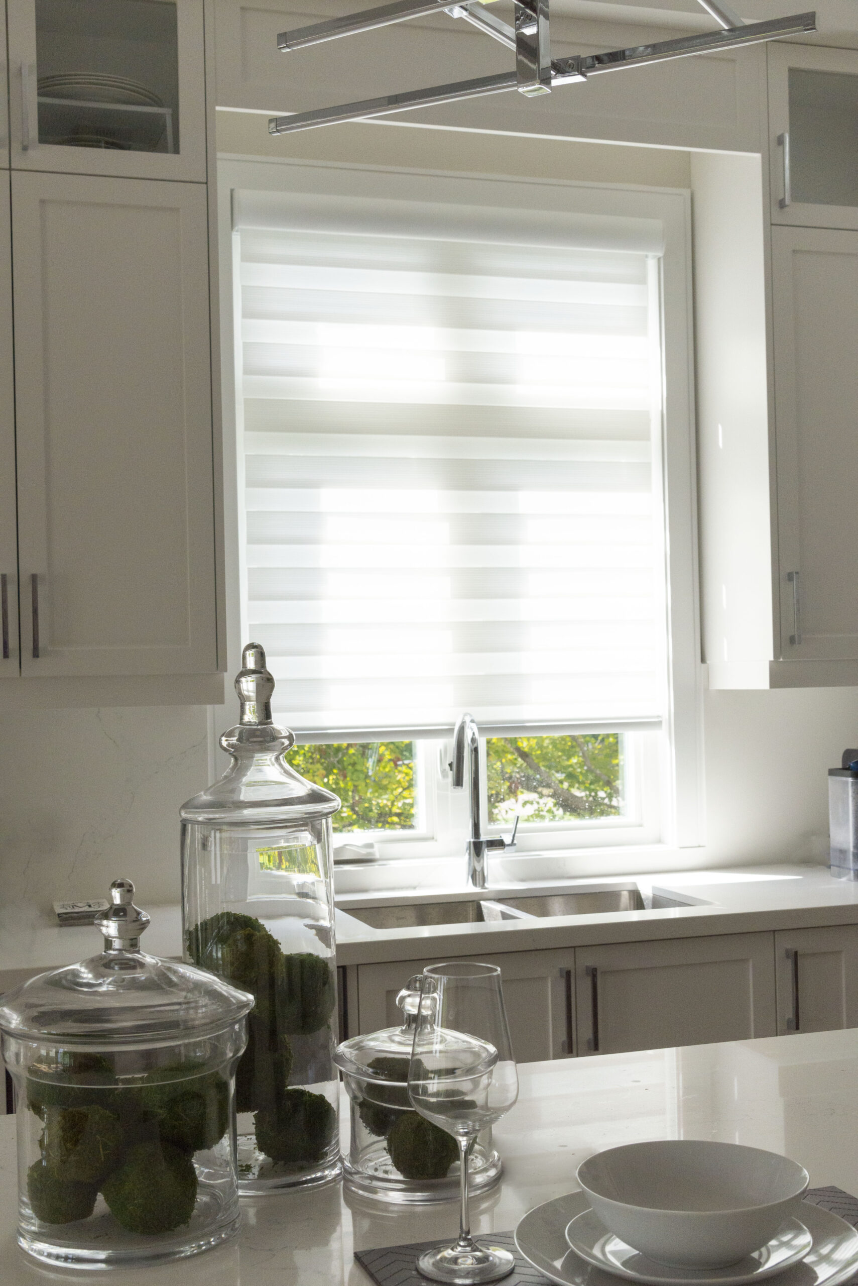 Kitchen with custom roller shades